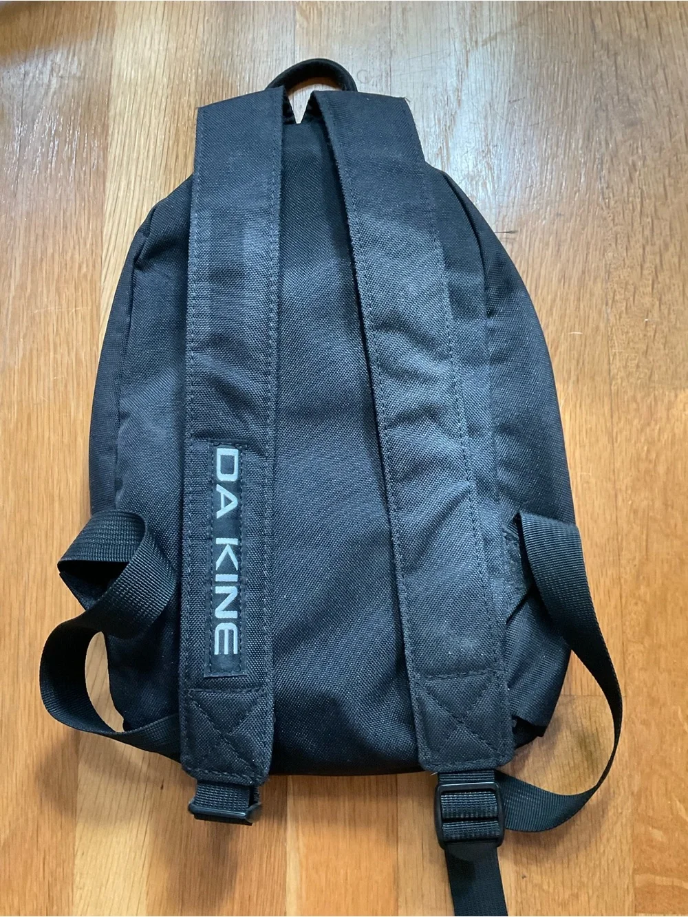 Dakine Blue and Black Sling Backpack with Front Bungee